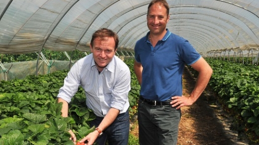 Open Farm Sunday 2014: Minister of State for Agriculture and Food, George Eustice (L) with grower Harry Hall (R), Hall Hunter Partnership, Tuesley Farm, Godalming, Surrey