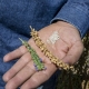 Image of farm manager holding the Rhenborg white Chia seed flower,dried Chia husk and seeds from the husk
