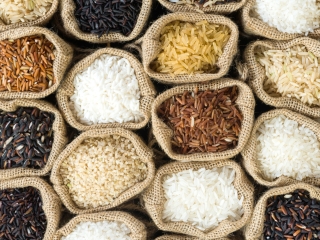 Top view Thai's rice collection in burlap bag